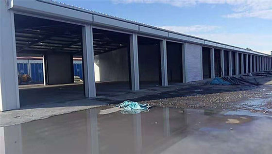 H ภาค Steel Prefab อาคารคลังสินค้า รุ่น Hot Rolled โกลาปานิเคราะห์เศรษฐกิจอุตสาหกรรม น้ําหนักเบา
