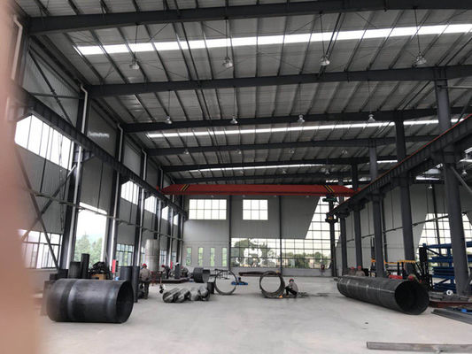 Qingdao คุณภาพสูง โกดังสแตนเลส Prefabricated โครงสร้างสแตนเลสออกแบบอาคารงานที่กําหนดเอง